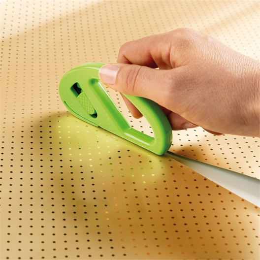 Coupe papier cadeau vert