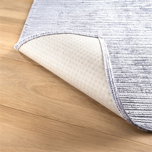 Couvre-fauteuil ou canapé antidérapant