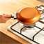 Copper coloured double crepe pan