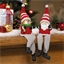 Lot de 2 figurines de Noël assises